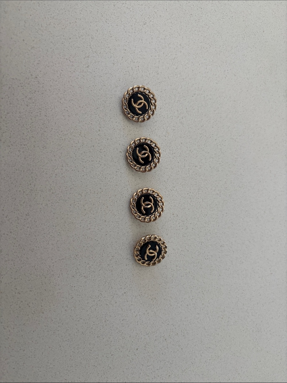 CHANEL Gold and Black Enamel Brooch Buttons - Set of 4